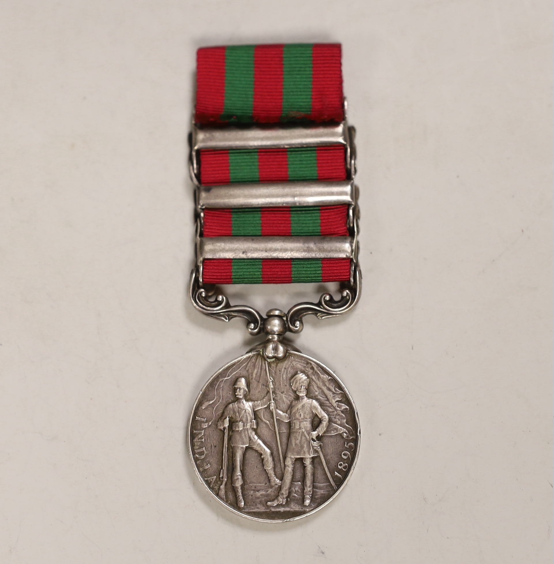 An India General Service medal 1895-1902 awarded to 4695 Pte J Wood 2nd, 13th King's Own Scottish Borders, with Tireh 1897-98, Punjab frontier 1897-98 and relief of Chitral 1895 clasps